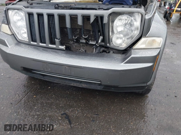 2012 Jeep Liberty Sport with VIN 1C4PJMAK2CW118636, listed as a IAAI auction lot 42646591 with 170,607 mi miles and . Bid and sale history available at DreamBid. Image 6.