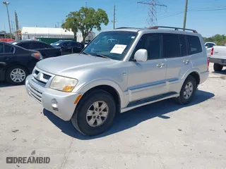 2003 Mitsubishi Montero LTD with VIN JA4NW51S53J030850, listed as a IAAI auction lot 42063733 with 210,810 mi miles. Bid and sale history available at carsss.com. Image 2.