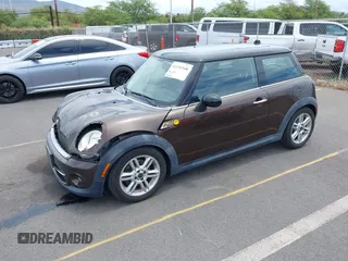 2012 MINI Hardtop with VIN WMWSU3C58CT261401, listed as a IAAI auction lot 42191548 with 96,115 mi miles and . Bid and sale history available at DreamBid. Image 2.