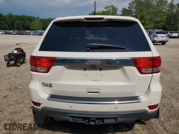 2012 Jeep Grand Cherokee Limited z VIN 1C4RJFBT0CC287342, wystawiony jako Copart lot #57000525 z przebiegiem 135 655 mil mil oraz Szkoda całkowita • Salvage title. Historia ofert i sprzedaży dostępna na DreamBid. Obrazek 6.