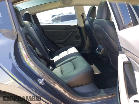 2023 Tesla Model 3 with VIN 5YJ3E1EA7PF673322, listed as a IAAI auction lot 42226767 with 18,367 mi miles and . Bid and sale history available at DreamBid. Image 8.