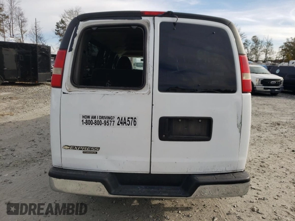 2014 Chevrolet Express Passenger LT with VIN 1GAZG1FG2E1202457, listed as a Copart auction lot 82704884 with 142,982 mi miles and Salvage title. Bid and sale history available at DreamBid. Image 6.