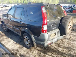 2006 Honda CR-V LX with VIN SHSRD68516U400389, listed as a IAAI auction lot 42005508 with 209,822 mi miles. Bid and sale history available at carsss.com. Image 3.