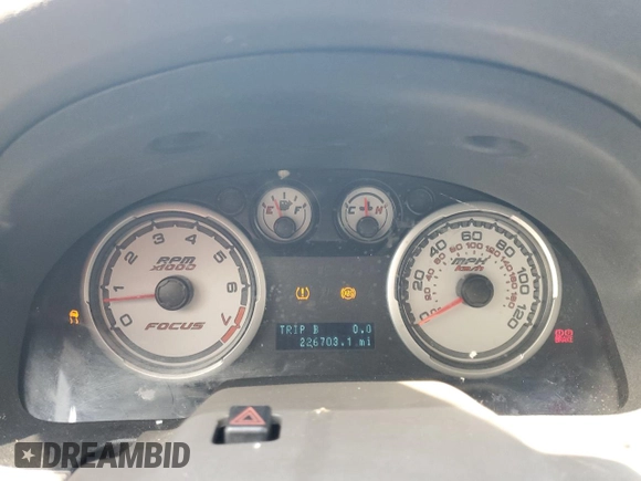 2010 Ford Focus SE with VIN 1FAHP3FN1AW168723, listed as a Copart auction lot 53871655 with 226,703 mi miles and Salvage Title. Bid and sale history available at DreamBid. Image 9.