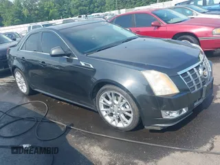 2012 Cadillac CTS Premium z VIN 1G6DS5E33C0108521, wystawiony jako IAAI lot #42599993 z przebiegiem 210 826 mil mil oraz . Historia ofert i sprzedaży dostępna na DreamBid. Obrazek 1.