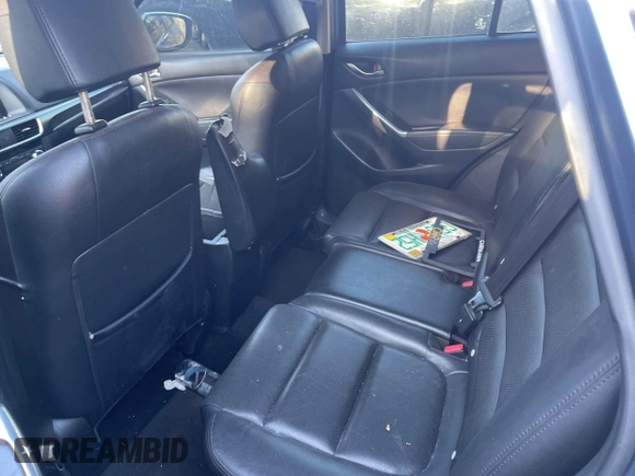 2016 Mazda CX-5 Grand Touring with VIN JM3KE4DY9G0673789, listed as a IAAI auction lot 42196841 with 98,622 mi miles and . Bid and sale history available at DreamBid. Image 8.