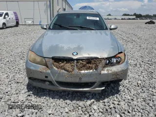 2007 BMW 3 Series 328i z VIN WBAVA33597PG52774, wystawiony jako Copart lot #60345555 z przebiegiem 189 361 mil mil oraz Szkoda całkowita • Salvage title. Historia ofert i sprzedaży dostępna na DreamBid. Obrazek 5.