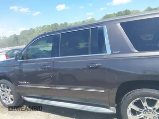 2015 GMC Yukon XL SLT z VIN 1GKS2HKC6FR122234, wystawiony jako IAAI lot #42325984 z przebiegiem 241 008 mil mil oraz . Historia ofert i sprzedaży dostępna na DreamBid. Obrazek 15.