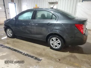 2014 Chevrolet Sonic LT with VIN 1G1JC5SH4E4239958, listed as a Copart auction lot 46082295 with 128,275 mi miles and Salvage Title. Bid and sale history available at DreamBid. Image 2.