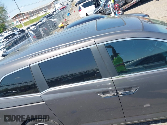 2013 Honda Odyssey EX-L with VIN 5FNRL5H65DB011071, listed as a IAAI auction lot 41992265 with 192,624 mi miles and . Bid and sale history available at DreamBid. Image 13.