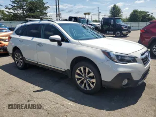 2019 Subaru Outback Touring with VIN 4S4BSATC7K3221137, listed as a Copart auction lot 66643915 with 173,317 mi miles and Salvage title. Bid and sale history available at DreamBid. Image 4.