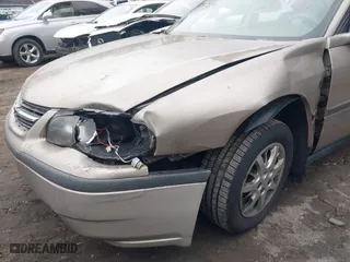 2002 Chevrolet Impala with VIN 2G1WF55E129105237, listed as a IAAI auction lot 41728297 with 142,049 mi miles. Bid and sale history available at carsss.com. Image 6.