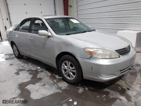 2004 Toyota Camry LE with VIN 4T1BF32K74U568974, listed as a IAAI auction lot 41590644 with 129,461 mi miles. Bid and sale history available at carsss.com. Image 1.