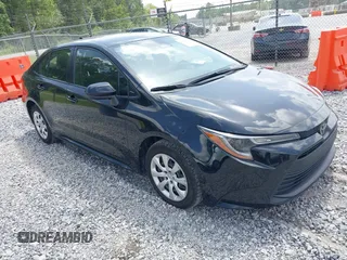 2023 Toyota Corolla LE z VIN JTDB4MEE3PJ000975, wystawiony jako IAAI lot #42462167 z przebiegiem 63 626 mil mil oraz . Historia ofert i sprzedaży dostępna na DreamBid. Obrazek 1.