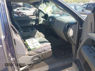 2005 Ford F-150 XLT with VIN 1FTPX14585NB29863, listed as a IAAI auction lot 42117501 with 305,480 mi miles. Bid and sale history available at carsss.com. Image 5.