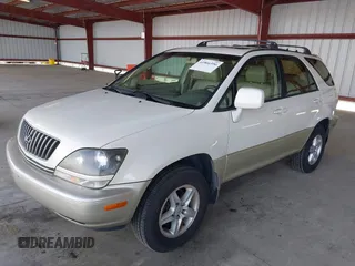 1999 Lexus RX 300 Luxury SUV with VIN JT6HF10UXX0020400, listed as a IAAI auction lot 41866556 with 237,899 mi miles. Bid and sale history available at carsss.com. Image 2.