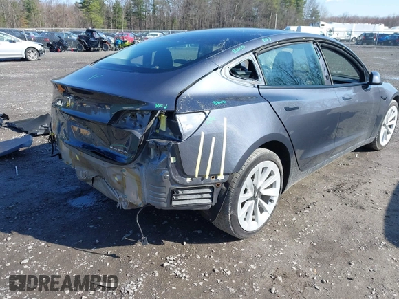 2022 Tesla Model 3 Long Range with VIN 5YJ3E1EB0NF365284, listed as a IAAI auction lot 41899706 with 36,463 mi miles and . Bid and sale history available at DreamBid. Image 4.
