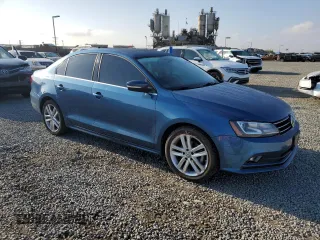 2017 Volkswagen Jetta SEL with VIN 3VWL17AJ6HM402590, listed as a Copart auction lot 54750005 with 60,509 mi miles and Salvage title. Bid and sale history available at DreamBid. Image 4.