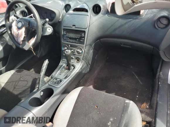2003 Toyota Celica GT z VIN JTDDR32T730157268, wystawiony jako Copart lot #68884804 z przebiegiem 209 728 mil mil oraz Nie do naprawy • Non repairable. Historia ofert i sprzedaży dostępna na DreamBid. Obrazek 8.