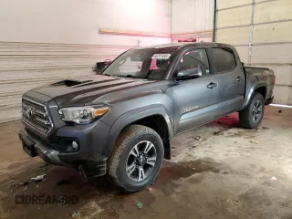 2016 Toyota Tacoma SR with VIN 3TMCZ5AN6GM013692, listed as a Copart auction lot 65727595 with 123,739 mi miles and Salvage title. Bid and sale history available at DreamBid. Image 1.