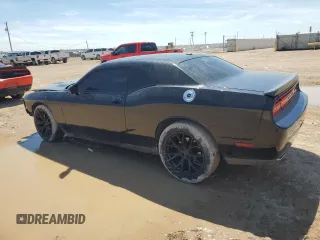 2013 Dodge Challenger SXT z VIN 2C3CDYAG0DH652215, wystawiony jako Copart lot #54781875 z przebiegiem 251 547 mil mil oraz Szkoda całkowita • Salvage title. Historia ofert i sprzedaży dostępna na DreamBid. Obrazek 2.