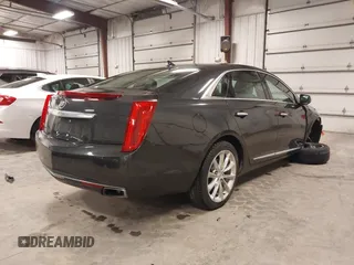 2013 Cadillac XTS Luxury with VIN 2G61R5S32D9101909, listed as a IAAI auction lot 41461611 with 110,603 mi miles. Bid and sale history available at carsss.com. Image 4.