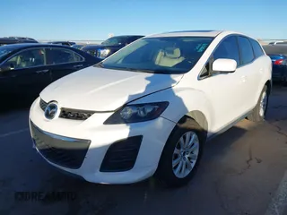 2010 Mazda CX-7 SV with VIN JM3ER2W55A0309112, listed as a IAAI auction lot 41198379 with 307,649 mi miles. Bid and sale history available at carsss.com. Image 2.