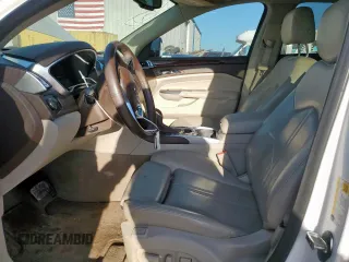 2016 Cadillac SRX Performance Collection with VIN 3GYFNCE37GS573748, listed as a Copart auction lot 66300135 with 136,619 mi miles and Salvage title. Bid and sale history available at DreamBid. Image 7.