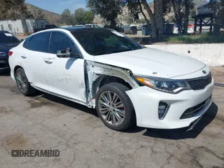 2018 Kia Optima SX with VIN 5XXGV4L22JG248495, listed as a IAAI auction lot 41992335 with 65,879 mi miles and . Bid and sale history available at DreamBid. Image 1.