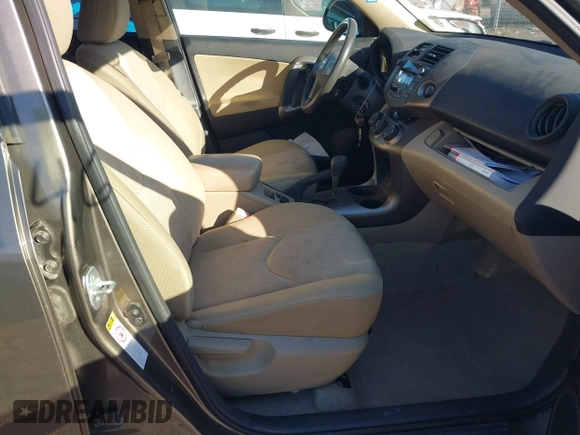 2010 Toyota RAV4 with VIN JTMBF4DV0A5031581, listed as a IAAI auction lot 41714611 with 186,814 mi miles. Bid and sale history available at carsss.com. Image 5.