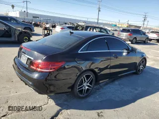2017 Mercedes-Benz E-Class E 400 with VIN WDDKJ6FB0HF356545, listed as a Copart auction lot 84530444 with 76,367 mi miles and Salvage Title. Bid and sale history available at carsss.com. Image 3.