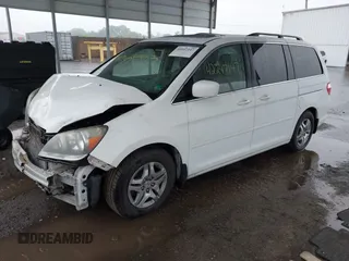 2007 Honda Odyssey EX-L z VIN 5FNRL38717B400727, wystawiony jako IAAI lot #42247147 z przebiegiem 199 430 mil mil oraz . Historia ofert i sprzedaży dostępna na DreamBid. Obrazek 17.