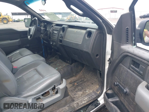 2014 Ford F-150 XL with VIN 1FTMF1CM1EKG31209, listed as a IAAI auction lot 42105573 with 187,162 mi miles and . Bid and sale history available at DreamBid. Image 5.