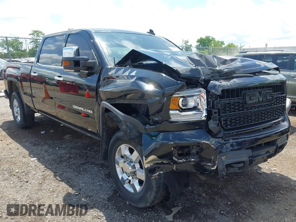 2015 GMC Sierra 2500HD Denali with VIN 1GT120E82FF574358, listed as a IAAI auction lot 42377676 with 86,097 mi miles and . Bid and sale history available at DreamBid. Image 1.