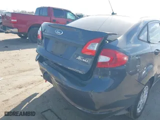 2012 Ford Fiesta SE with VIN 3FADP4BJ9CM180631, listed as a IAAI auction lot 41764566 with 103,554 mi miles. Bid and sale history available at carsss.com. Image 6.