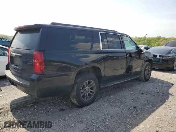 2019 Chevrolet Suburban LT with VIN 1GNSCHKC2KR167309, listed as a Copart auction lot 54475565 with 140,552 mi miles and Salvage Title. Bid and sale history available at DreamBid. Image 3.