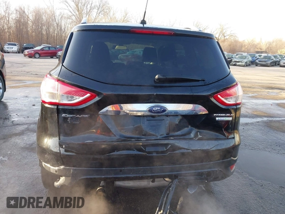 2014 Ford Escape Titanium with VIN 1FMCU0JX0EUC21512, listed as a IAAI auction lot 41781026 with 142,771 mi miles. Bid and sale history available at carsss.com. Image 16.