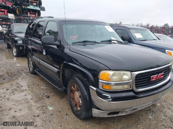 2004 GMC Yukon SLT with VIN 1GKEC13V34J307919, listed as a IAAI auction lot 41268767 with 1 mi miles. Bid and sale history available at carsss.com. Image 1.