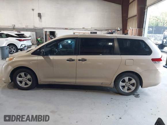 2012 Toyota Sienna with VIN 5TDZK3DC6CS258225, listed as a IAAI auction lot 42821817 with 377,789 mi miles and . Bid and sale history available at DreamBid. Image 14.