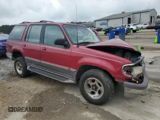 1996 Ford Explorer XL z VIN 1FMDU32X5TUD14799, wystawiony jako Copart lot #54529405 z przebiegiem 195 730 mil mil oraz Szkoda całkowita • Salvage title. Historia ofert i sprzedaży dostępna na DreamBid. Obrazek 4.