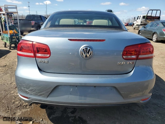 2014 Volkswagen Eos Komfort with VIN WVWBW8AH5EV004209, listed as a Copart auction lot 52424035 with 151,610 mi miles and Clean Title. Bid and sale history available at carsss.com. Image 6.