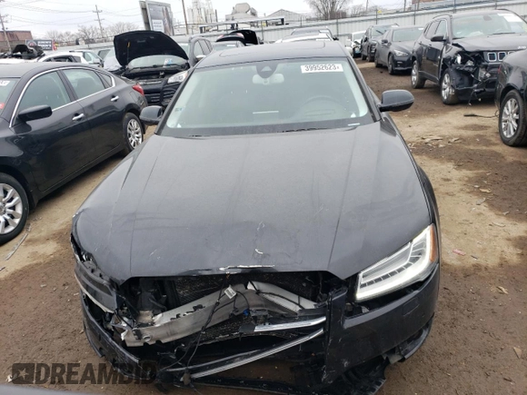 2015 Audi A8 4.0T with VIN WAUJ2AFD3FN024977, listed as a Copart auction lot 39952623 with 102,365 mi miles and . Bid and sale history available at DreamBid. Image 5.