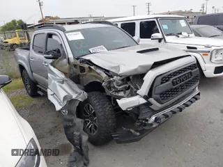 2017 Toyota Tacoma SR5 with VIN 3TMCZ5AN5HM074727, listed as a IAAI auction lot 41976419 with 102,600 mi miles. Bid and sale history available at carsss.com. Image 1.