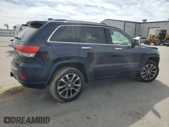 2017 Jeep Grand Cherokee Overland with VIN 1C4RJFCG6HC602413, listed as a Copart auction lot 49641325 with 157,558 mi miles and Salvage Title. Bid and sale history available at carsss.com. Image 3.