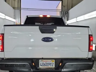 2020 Ford F-150 XL with VIN 1FTEW1E54LKD83593, listed as a IAAI auction lot 42387290 with 85,264 mi miles and . Bid and sale history available at DreamBid. Image 1.