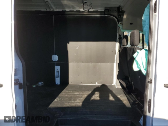 2023 Ford E-Transit Cargo z VIN 1FTBW9CK1PKB93878, wystawiony jako Copart lot #82899604 z przebiegiem 6009 mil mil oraz Szkody całkowita. Historia ofert i sprzedaży dostępna na DreamBid. Obrazek 11.