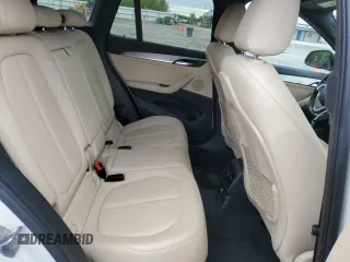 2016 BMW X1 xDrive28i z VIN WBXHT3C37GP882189, wystawiony jako Copart lot #56983985 z przebiegiem 45 700 mil mil oraz Szkoda całkowita • Salvage title. Historia ofert i sprzedaży dostępna na DreamBid. Obrazek 11.