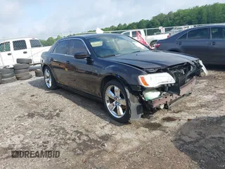 2013 Chrysler 300 with VIN 2C3CCAAG7DH659107, listed as a IAAI auction lot 42382945 with 125,050 mi miles and . Bid and sale history available at DreamBid. Image 1.