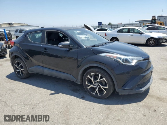 2018 Toyota C-HR XLE with VIN NMTKHMBXXJR044779, listed as a Copart auction lot 59895875 with 135,761 mi miles and Clean title. Bid and sale history available at DreamBid. Image 4.