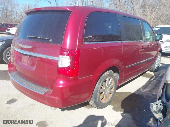 2015 Chrysler Town & Country Touring with VIN 2C4RC1BG9FR751398, listed as a IAAI auction lot 41646478 with 239,433 mi miles. Bid and sale history available at carsss.com. Image 4.
